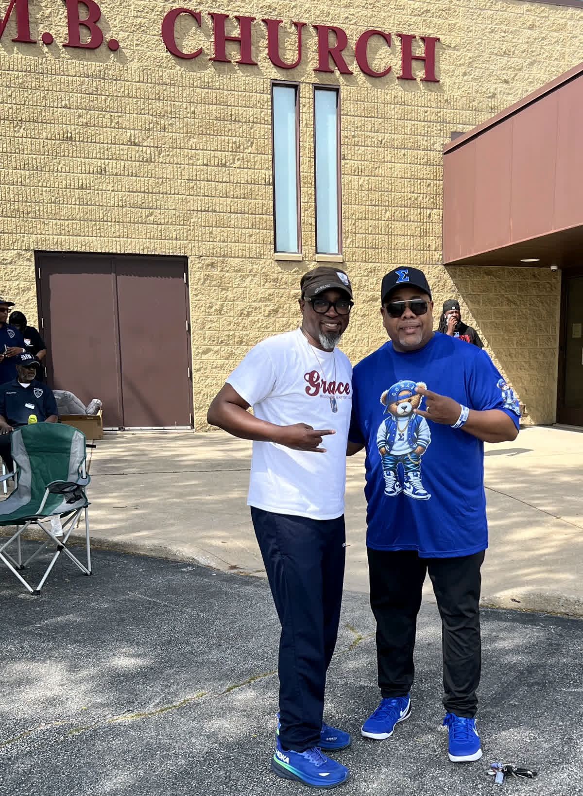 Brothers outside a church during a service day